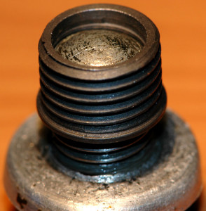 Time-sert insert on sump plug bolt