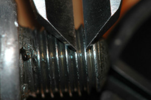 Closeup: measuring bolt thread pitch